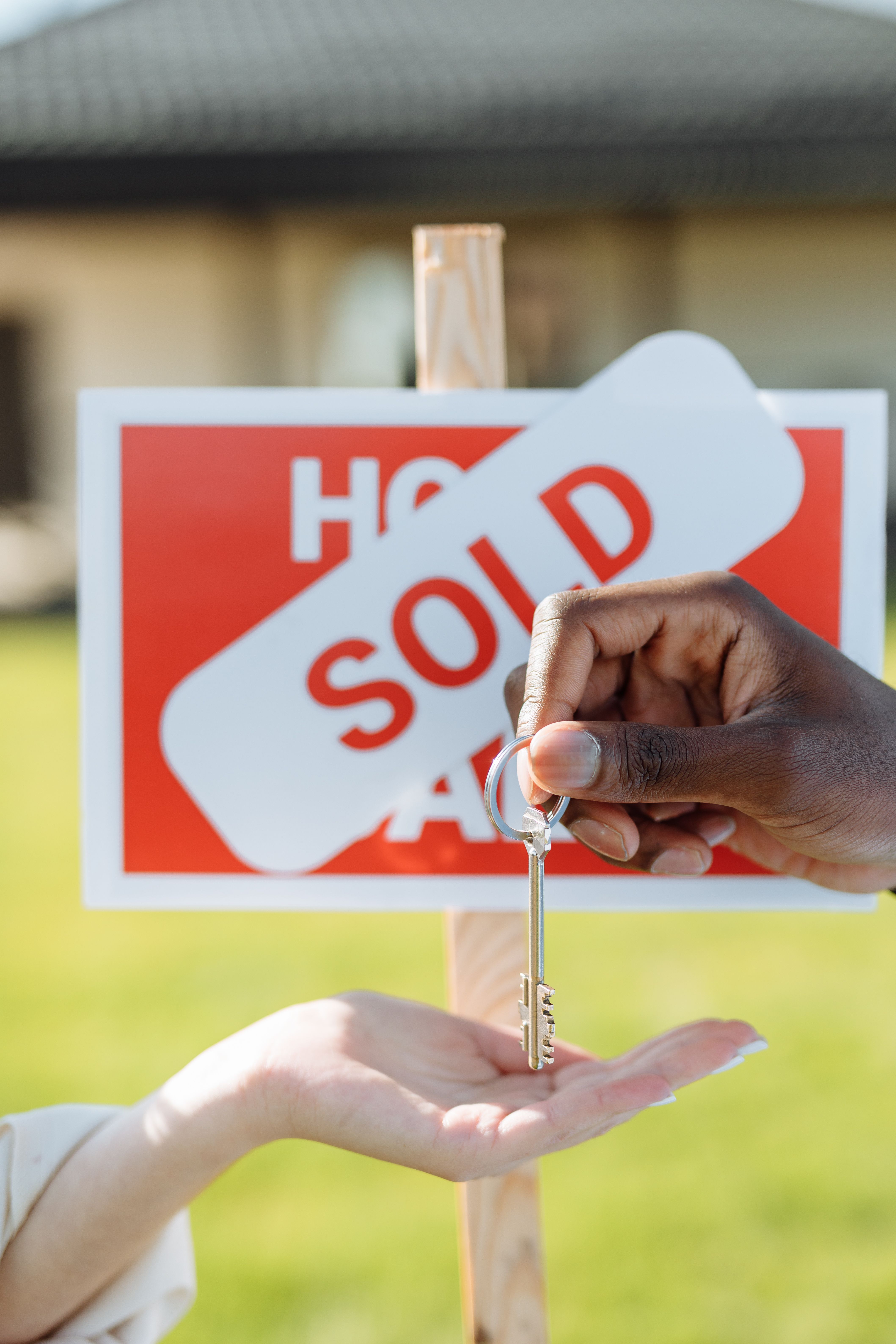 Keys being handed over at a Southern California home closing