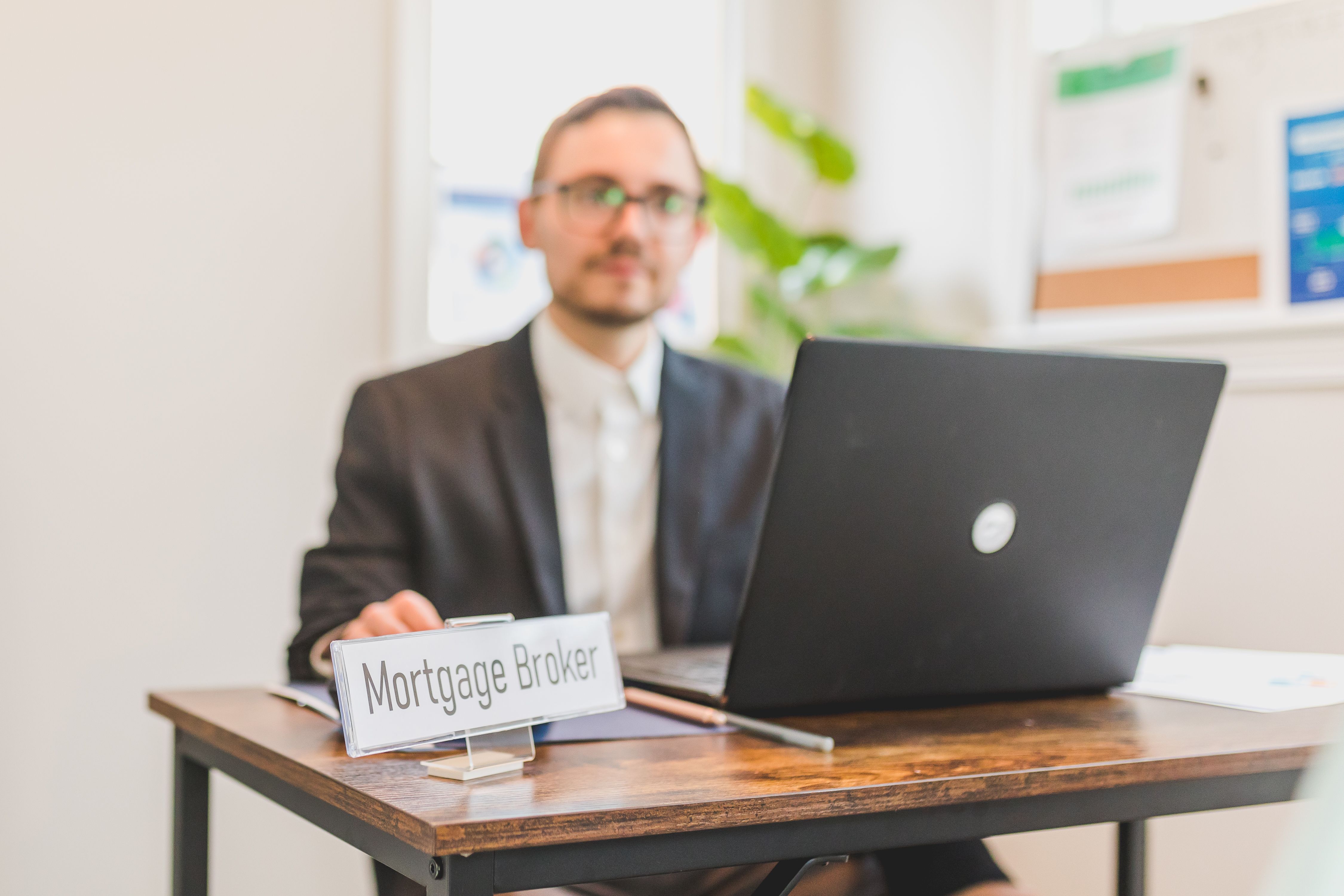 Real estate investor reviewing deal documents in a modern office